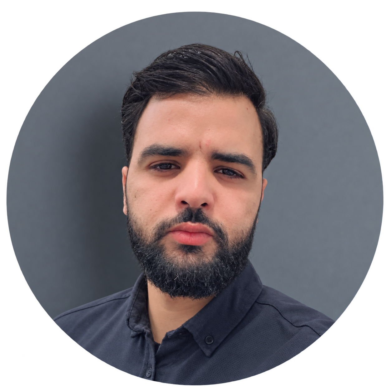 Circular bearded author avatar on grey backdrop
